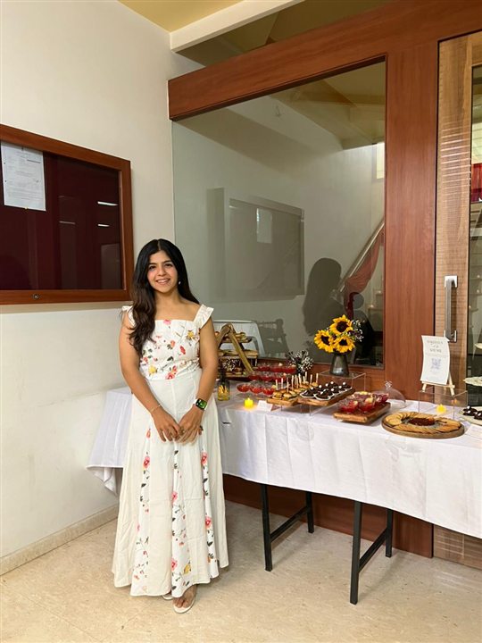 Chef Khushi Lalwani beside one of her BakeHaus grazing tables
